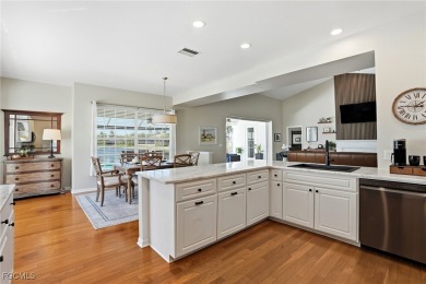 Savor endless, golden sunsets across the wide lake from this on Shell Point Golf Club in Florida - for sale on GolfHomes.com, golf home, golf lot