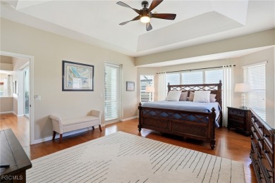 Savor endless, golden sunsets across the wide lake from this on Shell Point Golf Club in Florida - for sale on GolfHomes.com, golf home, golf lot