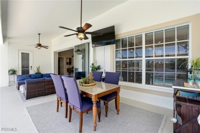 Savor endless, golden sunsets across the wide lake from this on Shell Point Golf Club in Florida - for sale on GolfHomes.com, golf home, golf lot
