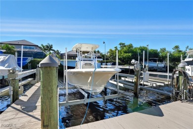 Savor endless, golden sunsets across the wide lake from this on Shell Point Golf Club in Florida - for sale on GolfHomes.com, golf home, golf lot