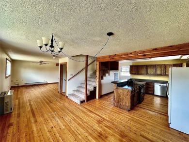 Incredible potential - 4 bed - 2.5 bath home on TWO LOTS within on Madison Meadows Golf Course in Montana - for sale on GolfHomes.com, golf home, golf lot