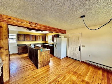 Incredible potential - 4 bed - 2.5 bath home on TWO LOTS within on Madison Meadows Golf Course in Montana - for sale on GolfHomes.com, golf home, golf lot