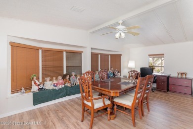Own this home in the resort like community of Barefoot Bay on Barefoot Bay Golf Course in Florida - for sale on GolfHomes.com, golf home, golf lot