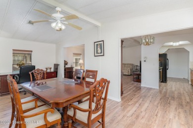 Own this home in the resort like community of Barefoot Bay on Barefoot Bay Golf Course in Florida - for sale on GolfHomes.com, golf home, golf lot