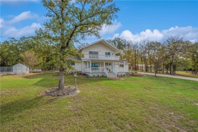 Discover luxury living at 30 Cherokee Drive in Hilltop Lakes! on Hilltop Lakes Resort Golf Club in Texas - for sale on GolfHomes.com, golf home, golf lot