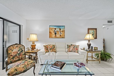 WELL KEPT FIRST FLOOR WITH TRANQUIL GOLF COURSE VIEW IN QUIET on Boca Delray Golf and Country Club in Florida - for sale on GolfHomes.com, golf home, golf lot