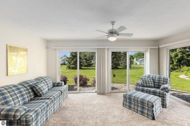 Welcome to easy living in the heart of Elk Rapids! This charming on Elk Rapids Golf Club in Michigan - for sale on GolfHomes.com, golf home, golf lot