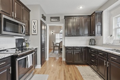 This beautiful home is nestled on a corner lot within the on Briarbrook Golf Course in Missouri - for sale on GolfHomes.com, golf home, golf lot