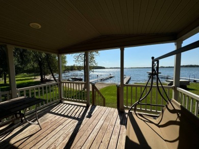 Two-bedroom one bath located on Roy Lake. 2009 14 x 55 mobile on Roy View Golf Course in South Dakota - for sale on GolfHomes.com, golf home, golf lot