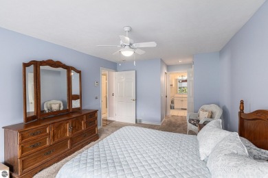 Welcome to easy living in the heart of Elk Rapids! This charming on Elk Rapids Golf Club in Michigan - for sale on GolfHomes.com, golf home, golf lot