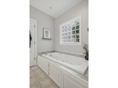 This beautiful home is nestled on a corner lot within the on Briarbrook Golf Course in Missouri - for sale on GolfHomes.com, golf home, golf lot