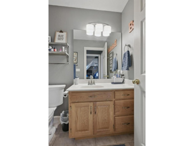 This beautiful home is nestled on a corner lot within the on Briarbrook Golf Course in Missouri - for sale on GolfHomes.com, golf home, golf lot
