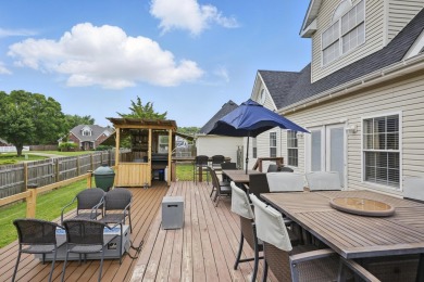This beautiful home is nestled on a corner lot within the on Briarbrook Golf Course in Missouri - for sale on GolfHomes.com, golf home, golf lot