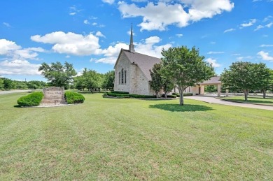 A beautiful 0.75 acre lot nestled between two private lakes on White Bluff Resort - Old Course in Texas - for sale on GolfHomes.com, golf home, golf lot
