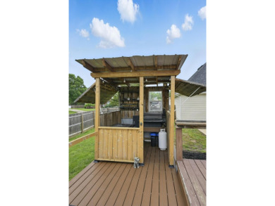 This beautiful home is nestled on a corner lot within the on Briarbrook Golf Course in Missouri - for sale on GolfHomes.com, golf home, golf lot