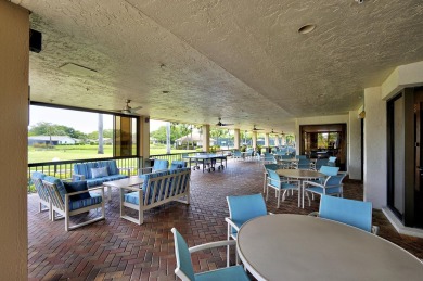 WELL KEPT FIRST FLOOR WITH TRANQUIL GOLF COURSE VIEW IN QUIET on Boca Delray Golf and Country Club in Florida - for sale on GolfHomes.com, golf home, golf lot