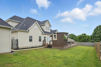 This beautiful home is nestled on a corner lot within the on Briarbrook Golf Course in Missouri - for sale on GolfHomes.com, golf home, golf lot