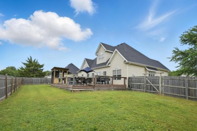 This beautiful home is nestled on a corner lot within the on Briarbrook Golf Course in Missouri - for sale on GolfHomes.com, golf home, golf lot
