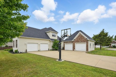 This beautiful home is nestled on a corner lot within the on Briarbrook Golf Course in Missouri - for sale on GolfHomes.com, golf home, golf lot