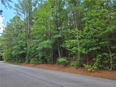 A Gorgeous Lot sitting high above the road and across from the on Woodlake Country Club in North Carolina - for sale on GolfHomes.com, golf home, golf lot
