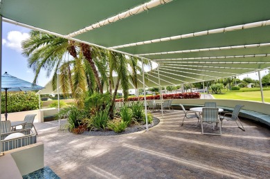 WELL KEPT FIRST FLOOR WITH TRANQUIL GOLF COURSE VIEW IN QUIET on Boca Delray Golf and Country Club in Florida - for sale on GolfHomes.com, golf home, golf lot