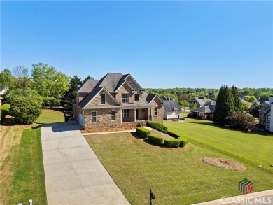 Welcome to 1116 Barberry Ct, nestled in the sought-after on Traditions of Braselton Golf Club in Georgia - for sale on GolfHomes.com, golf home, golf lot