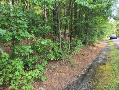 A Gorgeous Lot sitting high above the road and across from the on Woodlake Country Club in North Carolina - for sale on GolfHomes.com, golf home, golf lot