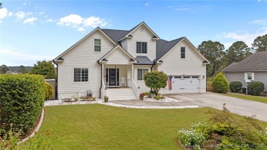 Discover this stunning home on a lakefront lot in the on Woodlake Country Club in North Carolina - for sale on GolfHomes.com, golf home, golf lot