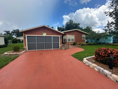 This well-loved 2-bedroom, 2-bathroom Palm Harbor home is being on Del Tura Golf and Country Club in Florida - for sale on GolfHomes.com, golf home, golf lot