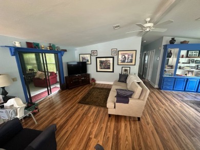 This well-loved 2-bedroom, 2-bathroom Palm Harbor home is being on Del Tura Golf and Country Club in Florida - for sale on GolfHomes.com, golf home, golf lot