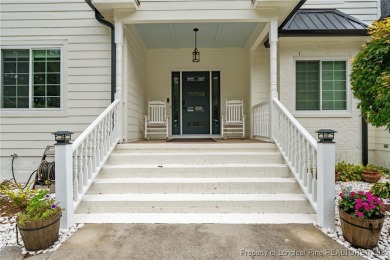 Discover this stunning home on a lakefront lot in the on Woodlake Country Club in North Carolina - for sale on GolfHomes.com, golf home, golf lot