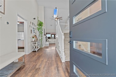 Discover this stunning home on a lakefront lot in the on Woodlake Country Club in North Carolina - for sale on GolfHomes.com, golf home, golf lot