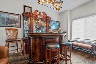 Discover this stunning home on a lakefront lot in the on Woodlake Country Club in North Carolina - for sale on GolfHomes.com, golf home, golf lot