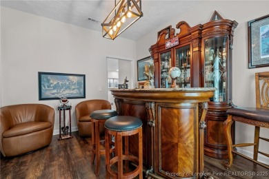 Discover this stunning home on a lakefront lot in the on Woodlake Country Club in North Carolina - for sale on GolfHomes.com, golf home, golf lot