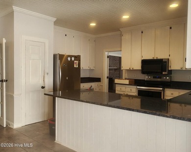 Unlock the potential of this spacious 3,200+ sq ft home tucked on Echo Farms Golf and Country Club in North Carolina - for sale on GolfHomes.com, golf home, golf lot