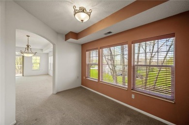Welcome to this sun-drenched corner unit overlooking the serene on Edinburgh USA in Minnesota - for sale on GolfHomes.com, golf home, golf lot