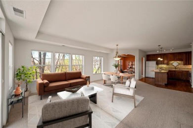 Welcome to this sun-drenched corner unit overlooking the serene on Edinburgh USA in Minnesota - for sale on GolfHomes.com, golf home, golf lot