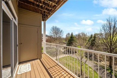 Welcome to this sun-drenched corner unit overlooking the serene on Edinburgh USA in Minnesota - for sale on GolfHomes.com, golf home, golf lot