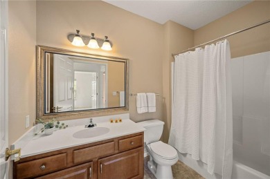 Welcome to this sun-drenched corner unit overlooking the serene on Edinburgh USA in Minnesota - for sale on GolfHomes.com, golf home, golf lot