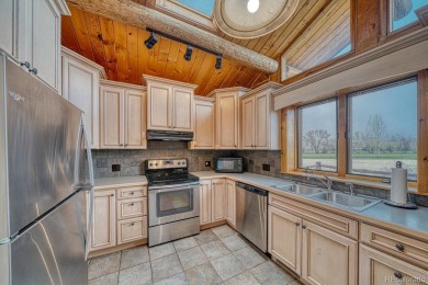 Welcome to your dream retreat! Nestled along the lush fairways on Collegiate Peaks Golf Course in Colorado - for sale on GolfHomes.com, golf home, golf lot