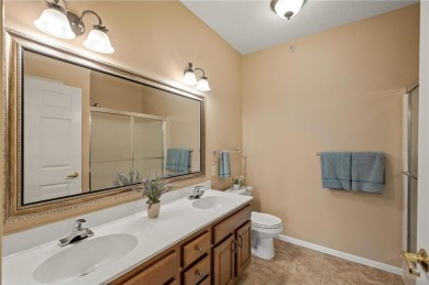 Welcome to this sun-drenched corner unit overlooking the serene on Edinburgh USA in Minnesota - for sale on GolfHomes.com, golf home, golf lot