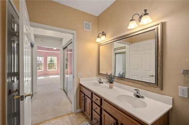 Welcome to this sun-drenched corner unit overlooking the serene on Edinburgh USA in Minnesota - for sale on GolfHomes.com, golf home, golf lot