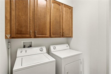 Welcome to this sun-drenched corner unit overlooking the serene on Edinburgh USA in Minnesota - for sale on GolfHomes.com, golf home, golf lot