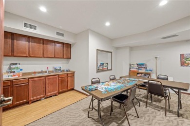 Welcome to this sun-drenched corner unit overlooking the serene on Edinburgh USA in Minnesota - for sale on GolfHomes.com, golf home, golf lot