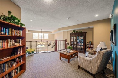 Welcome to this sun-drenched corner unit overlooking the serene on Edinburgh USA in Minnesota - for sale on GolfHomes.com, golf home, golf lot