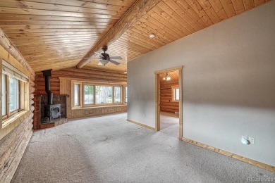 Welcome to your dream retreat! Nestled along the lush fairways on Collegiate Peaks Golf Course in Colorado - for sale on GolfHomes.com, golf home, golf lot