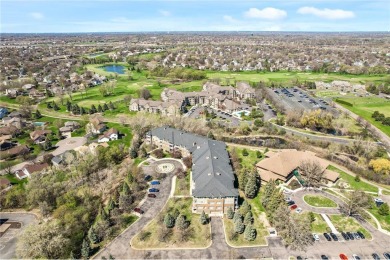 Welcome to this sun-drenched corner unit overlooking the serene on Edinburgh USA in Minnesota - for sale on GolfHomes.com, golf home, golf lot
