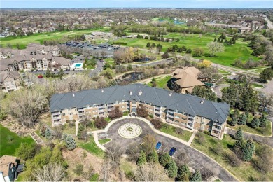 Welcome to this sun-drenched corner unit overlooking the serene on Edinburgh USA in Minnesota - for sale on GolfHomes.com, golf home, golf lot