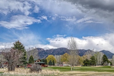 Welcome to your dream retreat! Nestled along the lush fairways on Collegiate Peaks Golf Course in Colorado - for sale on GolfHomes.com, golf home, golf lot