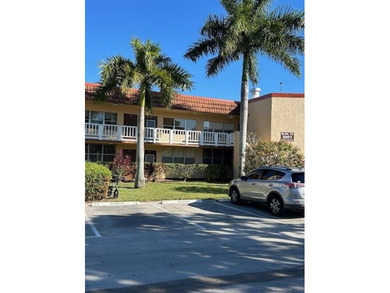 Welcome to easy living in the desirable Sunrise Lakes 55+ on Sunrise Lakes Phase III in Florida - for sale on GolfHomes.com, golf home, golf lot